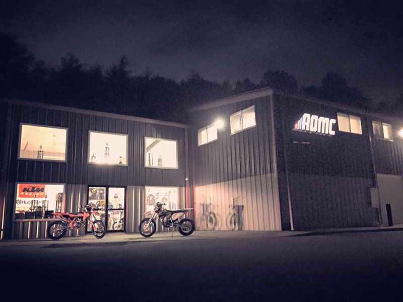 The AOMC logo used as signage at company headquarters in Cross Lanes, West Virginia.