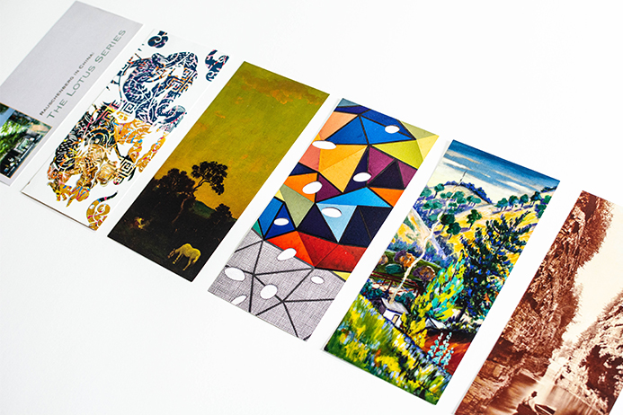 Card fronts feature artwork relevant to each exhibition.